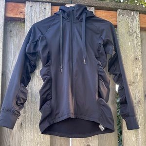 Dance brand JO JAX black ruffled jacket.